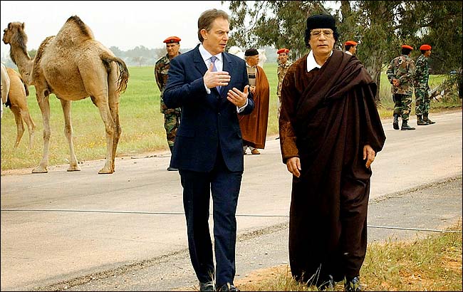 Prime Minister Tony Blair of Britain met with Colonel Muammar A-Qaddafi, signaling an end of Colonel Qaddafi's estrangement from the West, Tripoli, March 25, 2004.